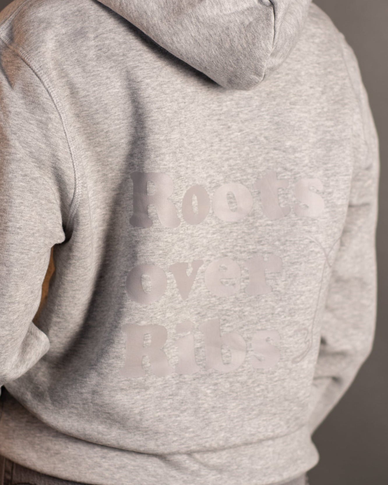 Hoodie "Roots over Ribs" unisex